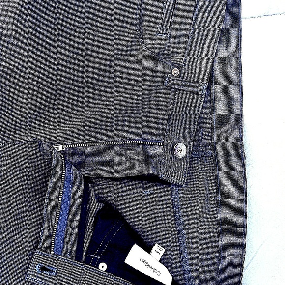 NWOT Calvin Klein pants. Size 34w and 34inseam. Color is blk/gray. - Picture 11 of 12